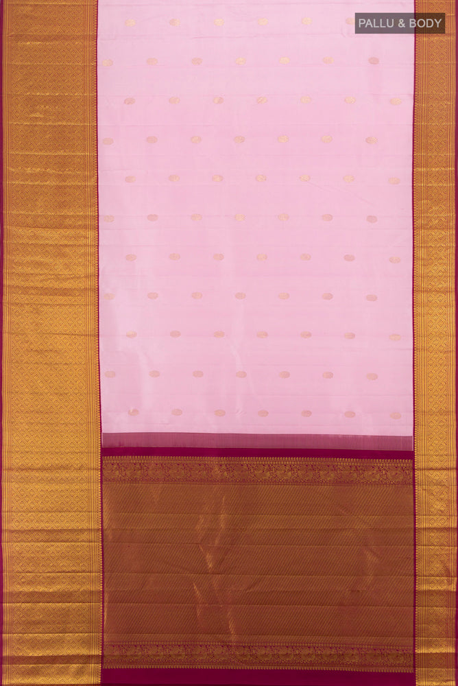 Flat view of Pure Silk Pure Zari Rose Gold Kanjivaram Saree with Zari Butta on the body and Silk Border. 