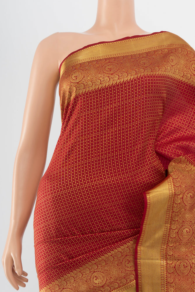 Border image of Pure Silk Pure Zari Maroon Kanjivaram Saree with Zari Butta on the body and Silk Border. 