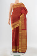 Pure Silk Pure Zari Maroon Kanjivaram Saree with Zari Butta on the body and Silk Border.  displayed on a mannequin