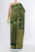 Mint Green Kanjivaram Silk Saree with Zari Butta on the body and Silk Border.  displayed on a mannequin