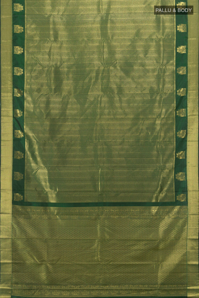 Flat view of Mint Green Kanjivaram Silk Saree with Zari Butta on the body and Silk Border. 