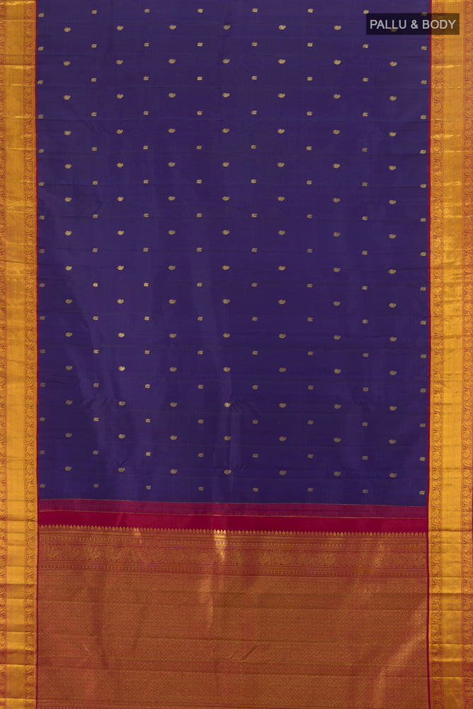 Flat view of Pure Silk Pure Zari Navy Blue Kanjivaram Saree with Zari Butta on the body and Silk Border. 