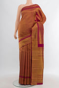 Maroon Kanjivaram Silk Saree with Zari Brocade on the body and Zari Border.  displayed on a mannequin
