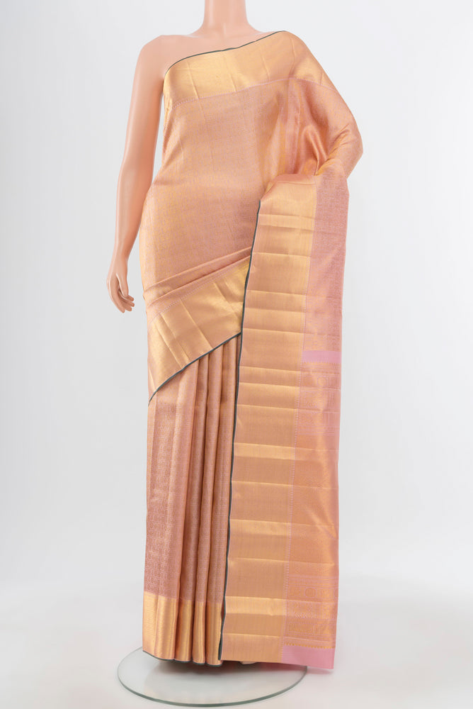 Pure Silk Pure Zari Golden Kanjivaram Saree with Zari Brocade on the body and Silk Border.  displayed on a mannequin