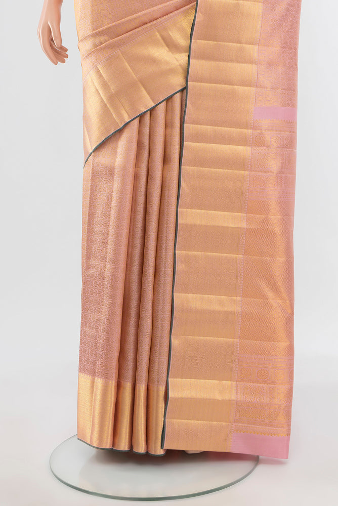 Pleats and pallu of Pure Silk Pure Zari Golden Kanjivaram Saree with Zari Brocade on the body and Silk Border. 