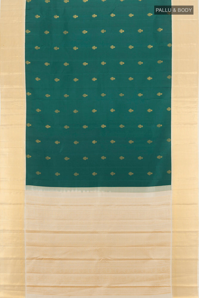 Flat view of Mint Green Kanjivaram Silk Saree with Zari Butta on the body and Silk Border. 