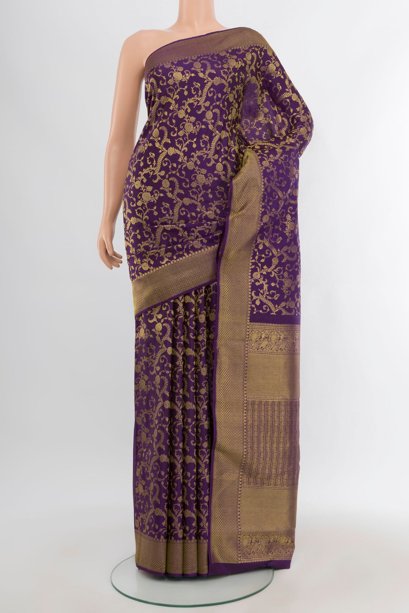 Violet Kanjivaram Silk Saree with Zari Brocade on the body and Zari Border.  displayed on a mannequin