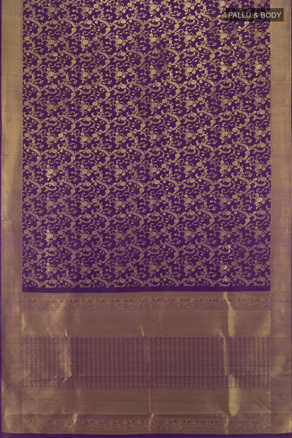 Flat view of Violet Kanjivaram Silk Saree with Zari Brocade on the body and Zari Border. 