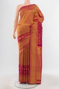 Pure Silk Pure Zari Maroon Kanjivaram Saree with Zari Butta on the body and Silk Border.  displayed on a mannequin