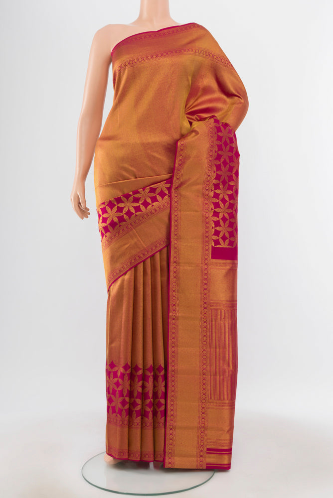 Pure Silk Pure Zari Maroon Kanjivaram Saree with Zari Butta on the body and Silk Border.  displayed on a mannequin