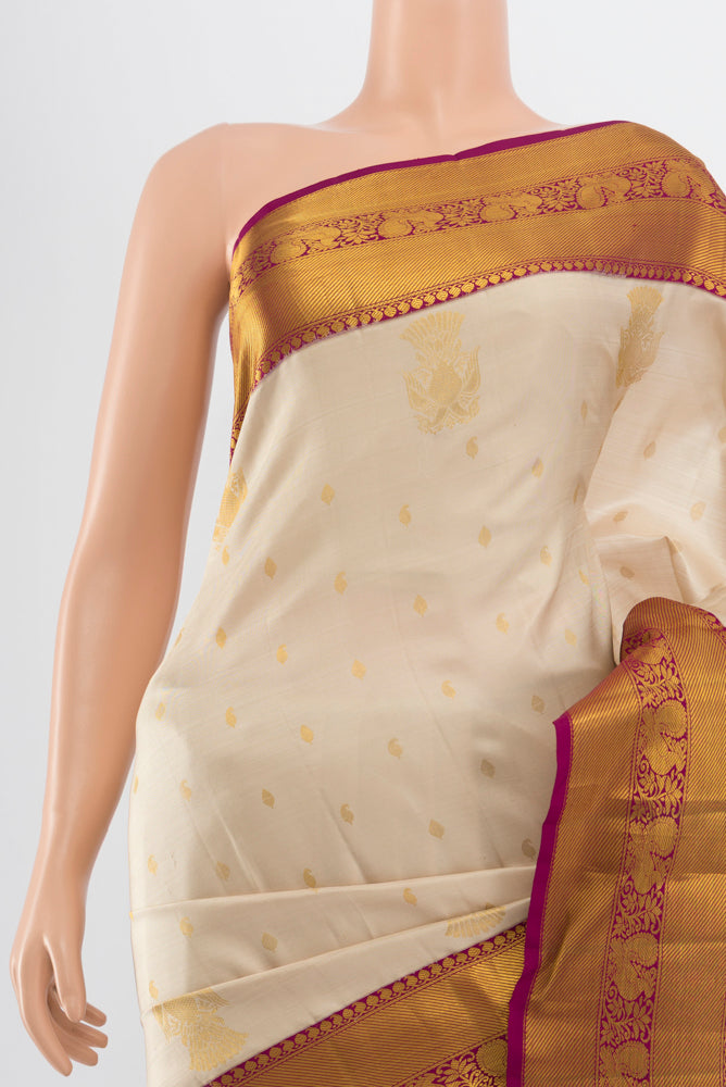 Border image of Pure Silk Pure Zari Cream Kanjivaram Saree with Zari Butta on the body and Silk Border. 