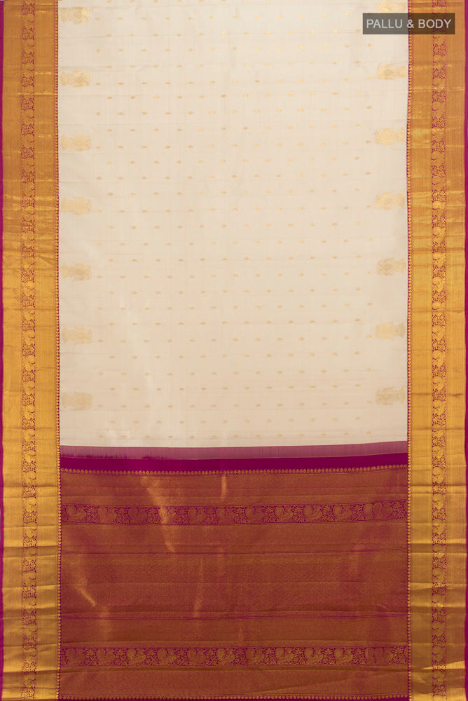 Flat view of Pure Silk Pure Zari Cream Kanjivaram Saree with Zari Butta on the body and Silk Border. 