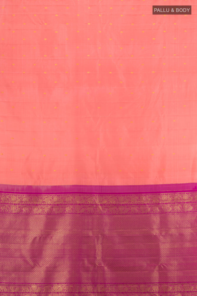 Flat view of Peach Kanchipuram Silk Saree with Zari Butta on the body and Silk Border. 