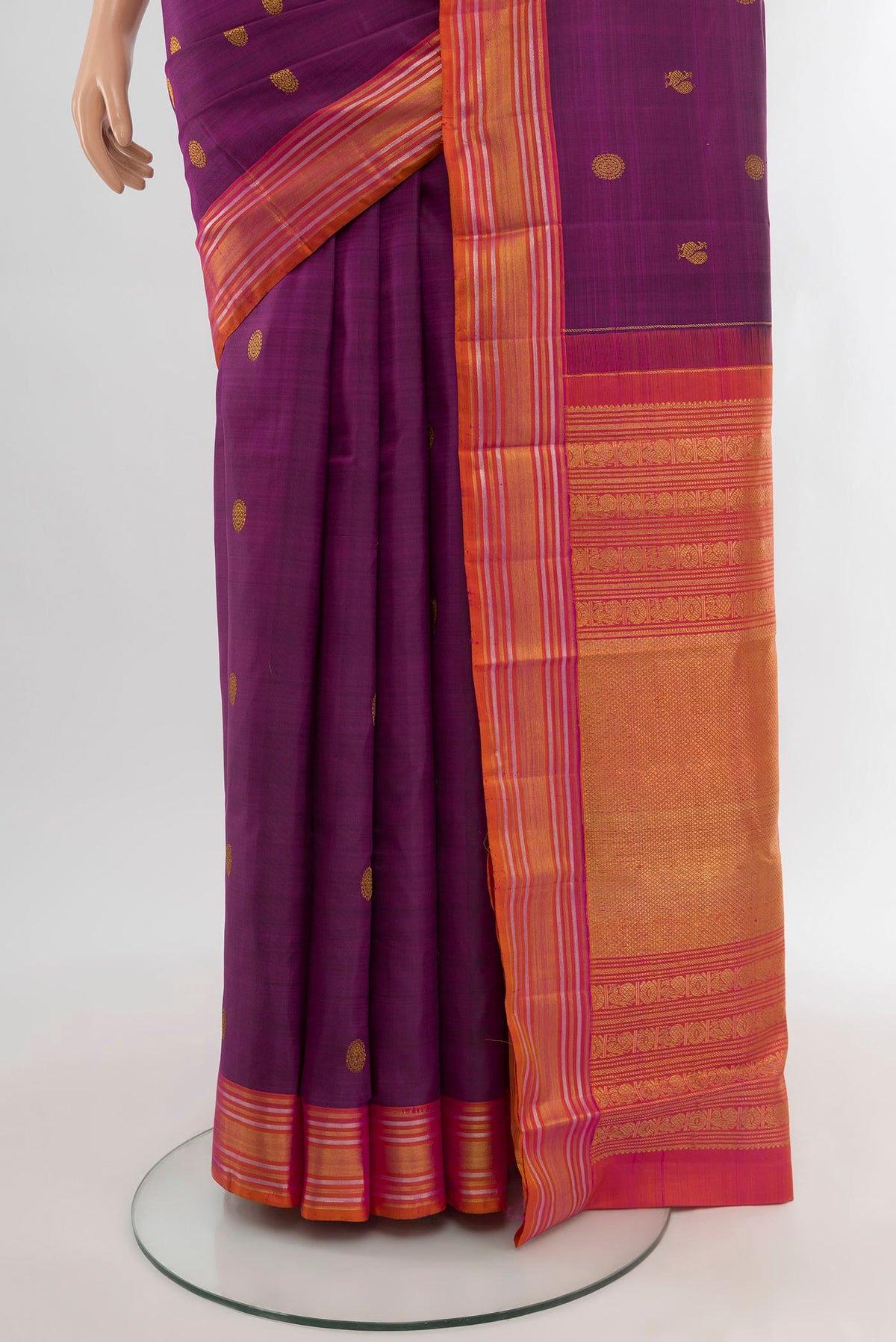 Pleats and pallu of Purple Kanjivaram Silk Saree with Zari Butta on the body and Zari Border. 