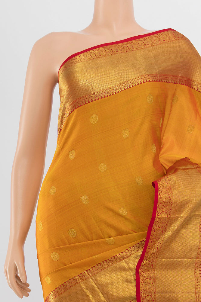Border image of Pure Silk Pure Zari Mustard Kanjivaram Saree with Zari Butta on the body and Silk Border. 