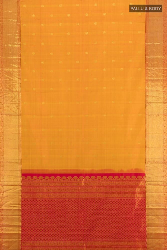 Flat view of Pure Silk Pure Zari Mustard Kanjivaram Saree with Zari Butta on the body and Silk Border. 