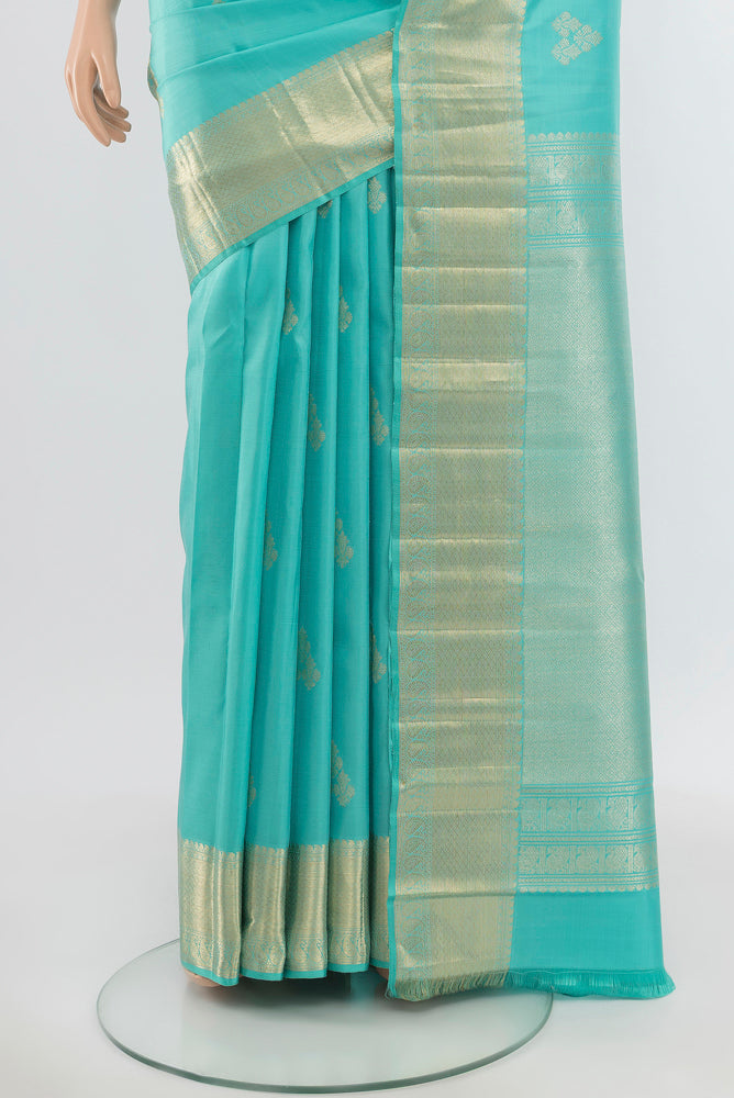 Pleats and pallu of Pure Silk Pure Zari Sky Blue Kanjivaram Saree with Zari Butta on the body and Silk Border. 
