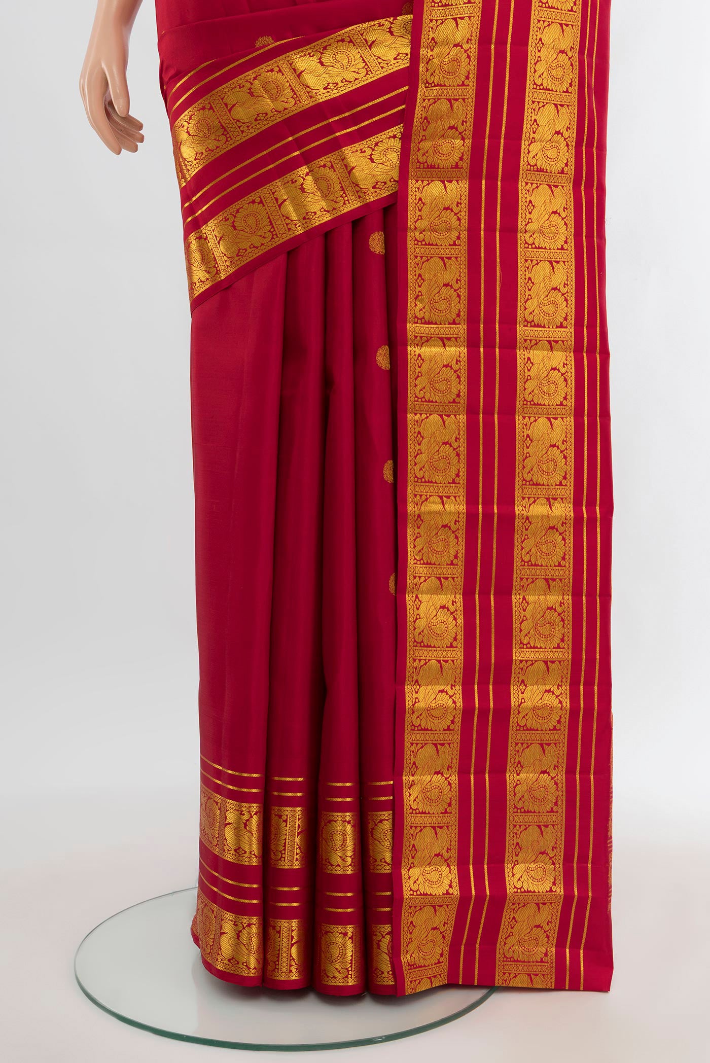 Pleats and pallu of Red Kanjivaram Silk Saree with Zari Butta on the body and Zari Border. 