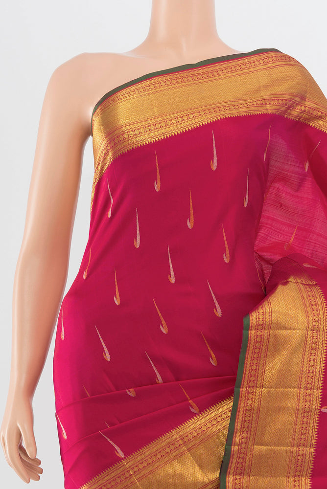 Border image of Pure Silk Pure Zari Peach Kanjivaram Saree with Zari Butta on the body and Silk Border. 