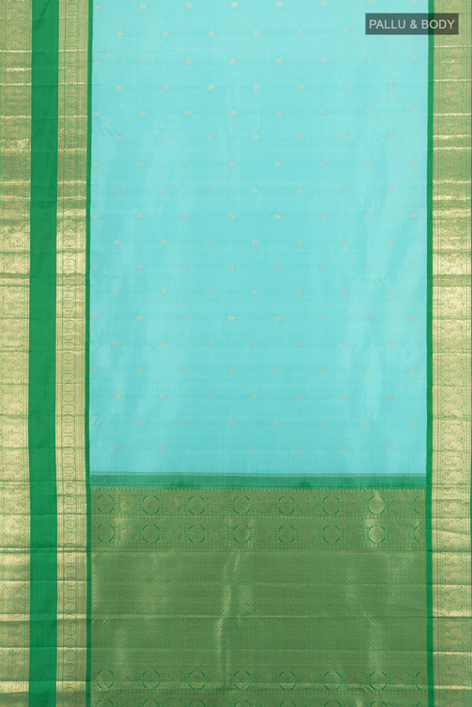 Flat view of Pure Silk Pure Zari Sky Blue Kanchipuram Saree with Zari Butta on the body and Silk Border. 