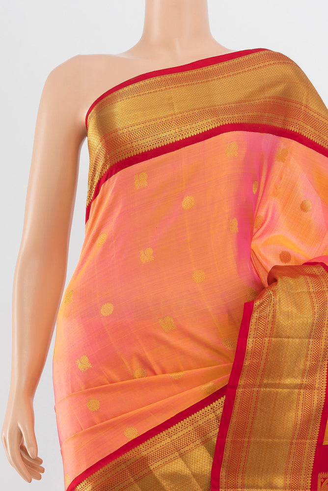 Border image of Pure Silk Pure Zari Peach Kanchipuram Saree with Zari Butta on the body and Silk Border. 