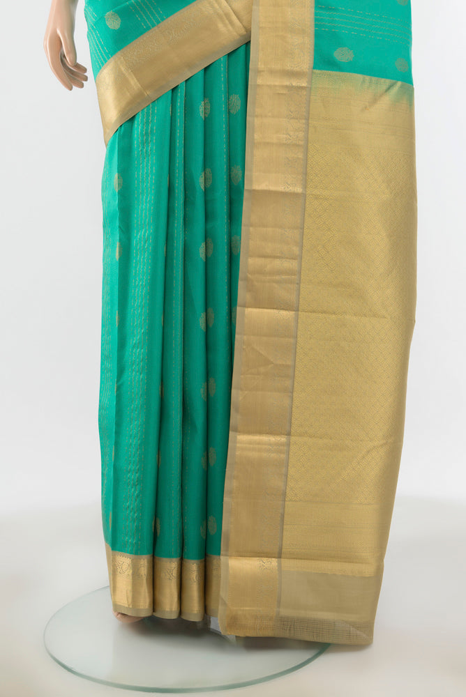 Pleats and pallu of Sky Blue Kanchipuram Silk Saree with Zari Butta on the body and Silk Border. 