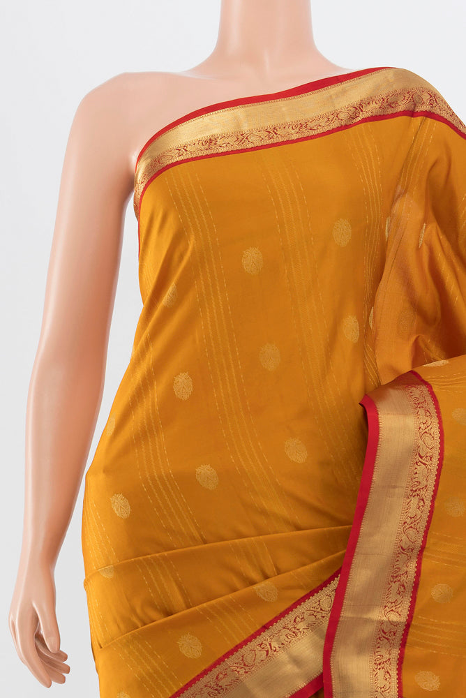 Border image of Pure Silk Pure Zari Mustard Kanchipuram Saree with Zari Brocade on the body and Silk Border. 
