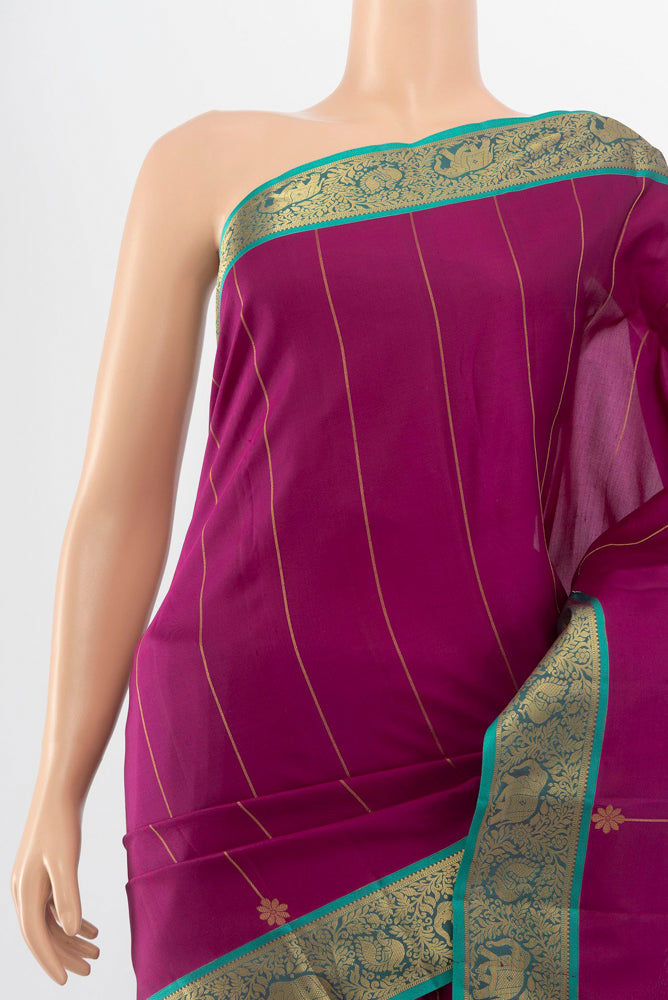 Border image of Purple Kanchipuram Silk Saree with Zari Butta on the body and Silk Border. 