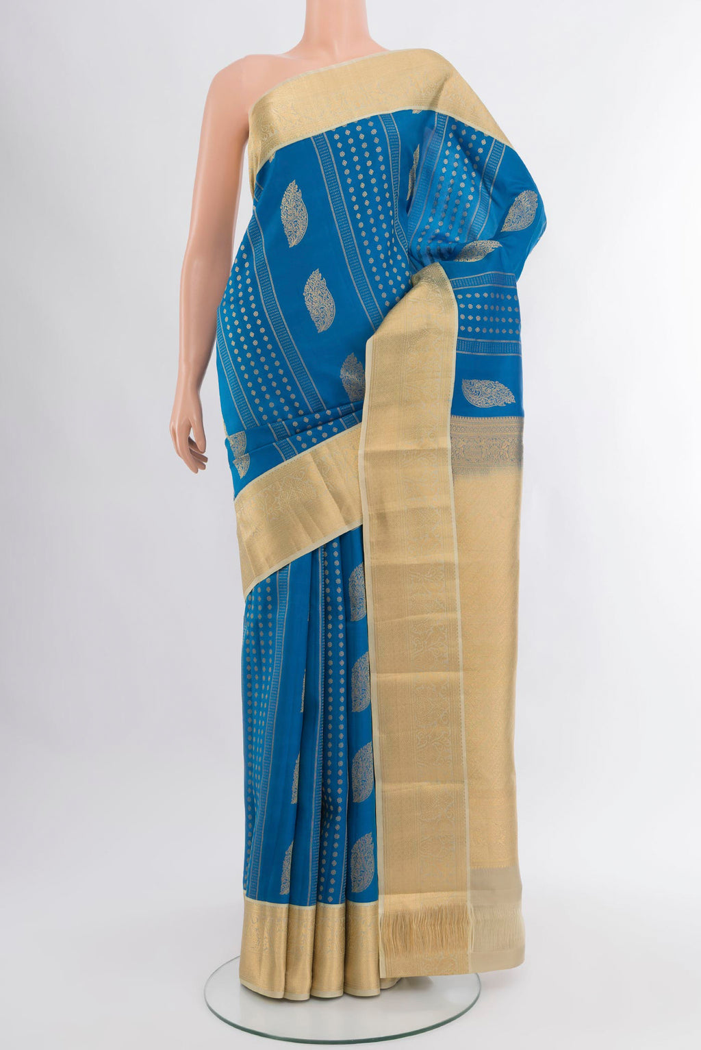 Blue Kanjivaram Silk Saree with Zari Butta on the body and Zari Border.  displayed on a mannequin