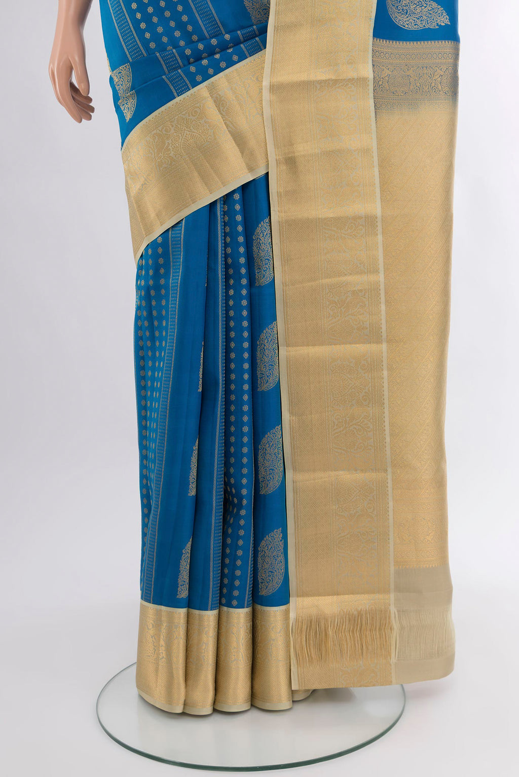 Pleats and pallu of Blue Kanjivaram Silk Saree with Zari Butta on the body and Zari Border. 