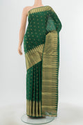 Pure Silk Pure Zari Mint Green Kanchipuram Saree with Zari Butta on the body and Silk Border.  displayed on a mannequin