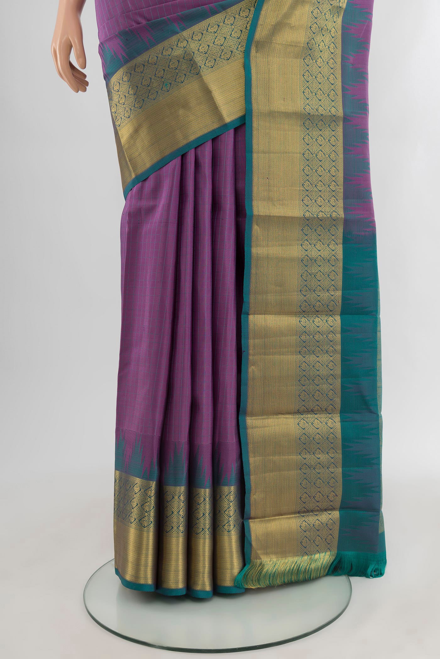 Pleats and pallu of Lavender Kanjivaram Silk Saree with Stripes on the body and Zari Border. 