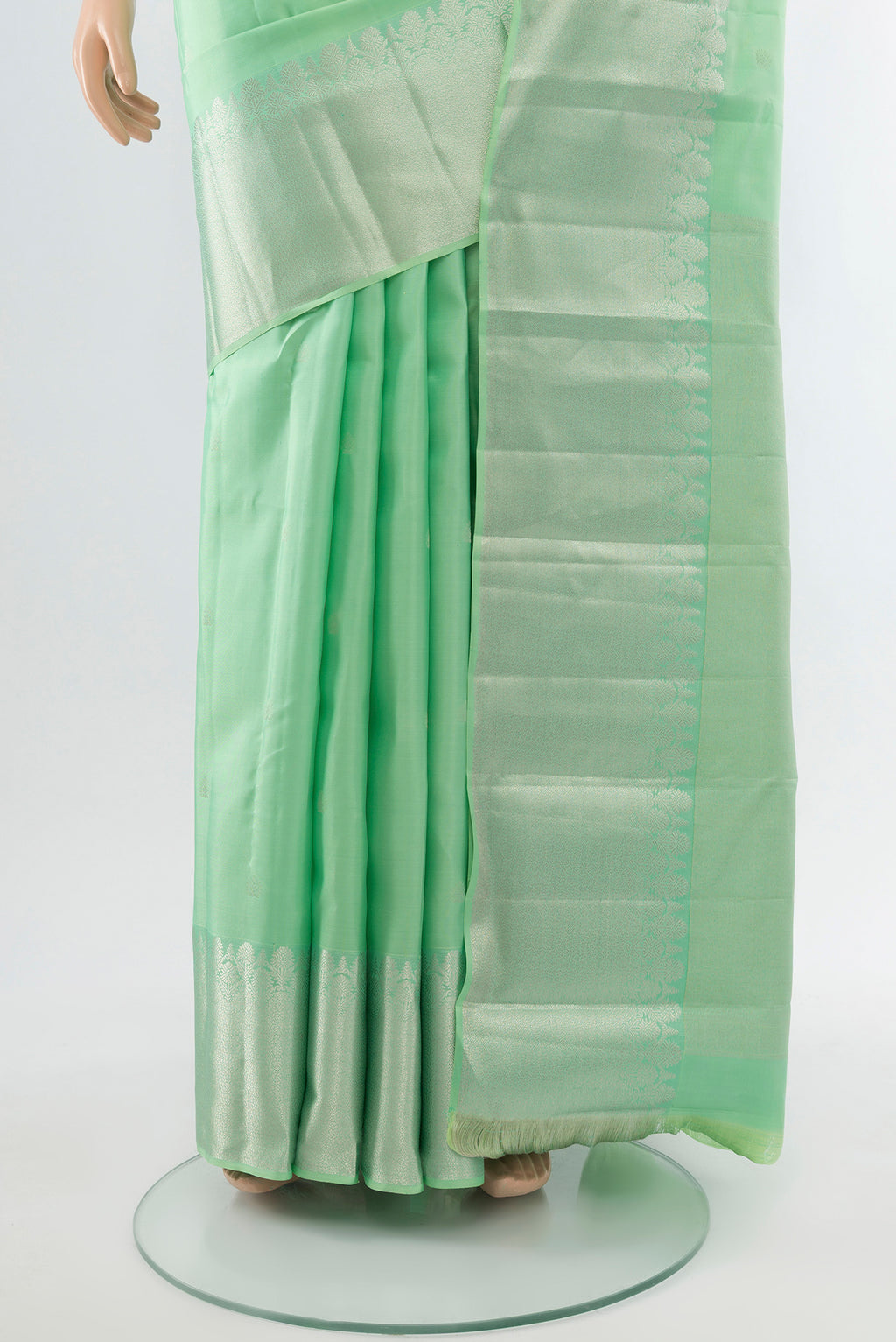 Pleats and pallu of Sea Green Kanchipuram Silk Saree with Zari Butta on the body and Silk Border. 
