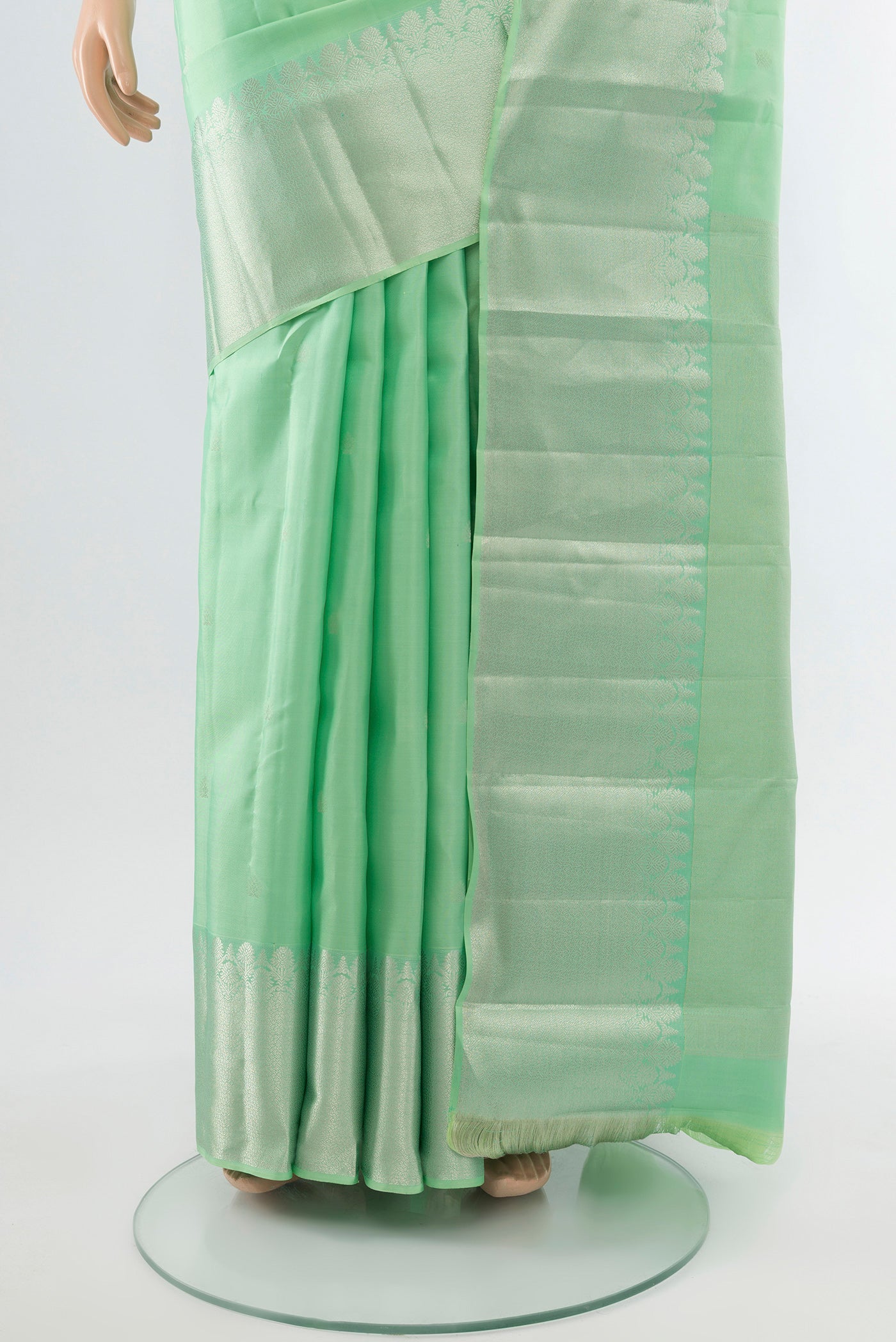 Pleats and pallu of Sea Green Kanchipuram Silk Saree with Zari Butta on the body and Silk Border. 