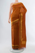 Brown Kanchipuram Silk Saree with Zari Butta on the body and Silk Border.  displayed on a mannequin