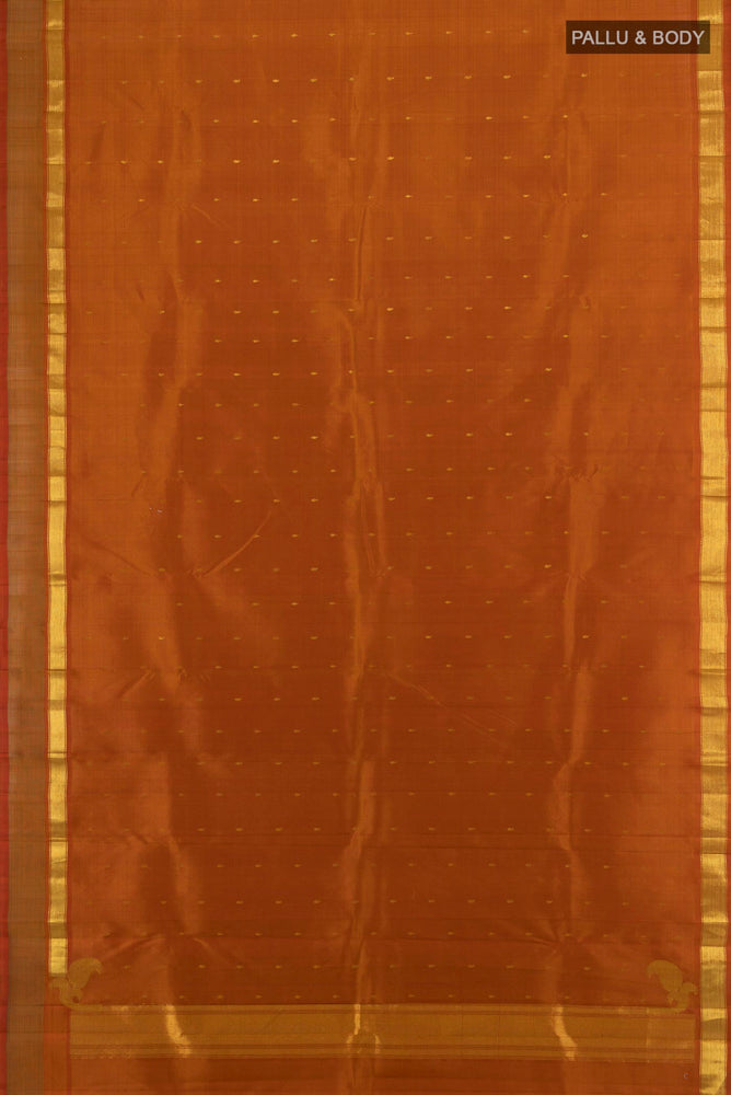 Flat view of Brown Kanchipuram Silk Saree with Zari Butta on the body and Silk Border. 