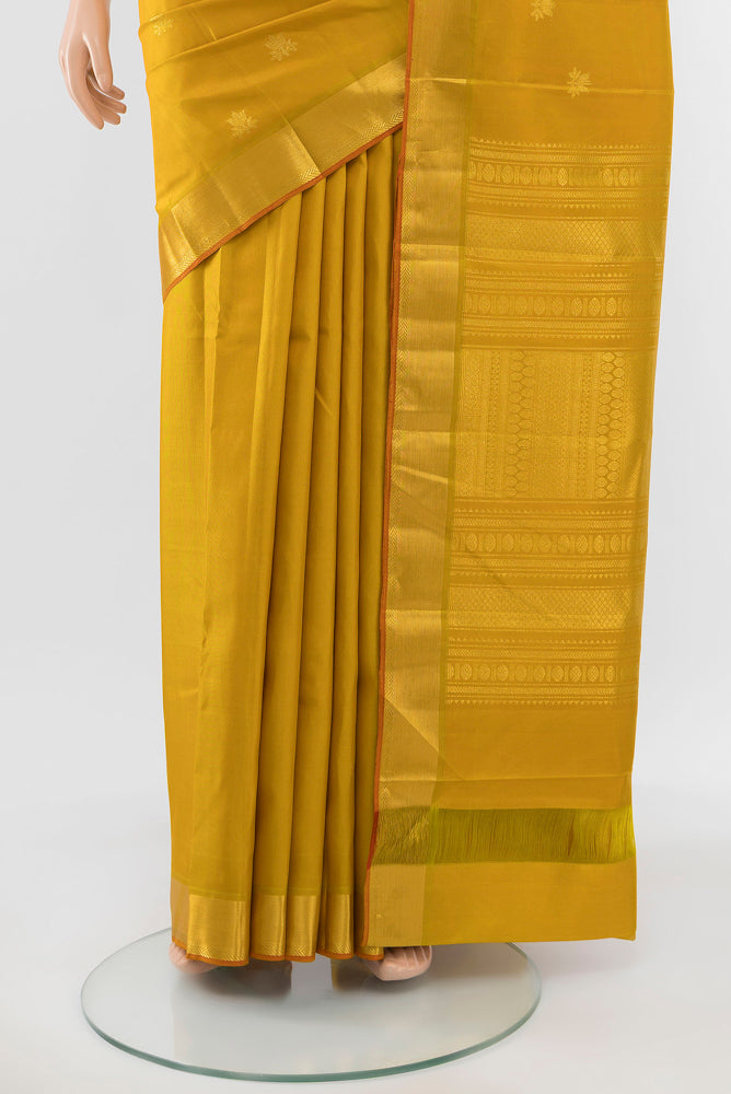 Pleats and pallu of Pure Silk Pure Zari Mustard Kanjivaram Saree with Zari Brocade on the body and Silk Border. 