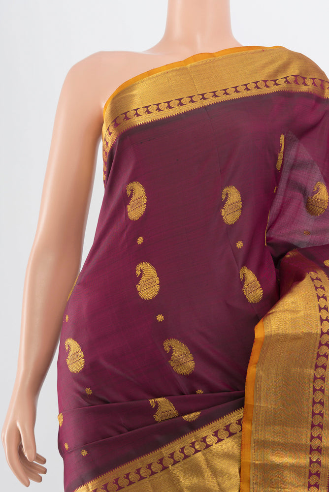 Border image of Pure Silk Pure Zari Maroon Kanjivaram Saree with Zari Butta on the body and Silk Border. 