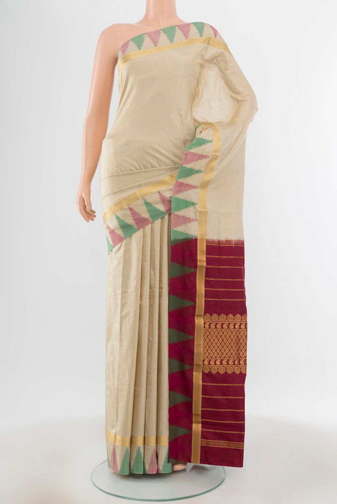 Beige Bangalore Silk - kadyal Saree with Plain Body and Silk Border.  displayed on a mannequin