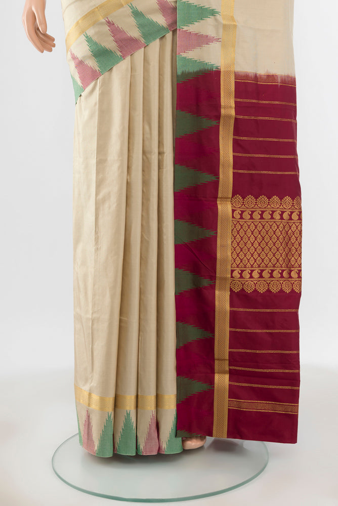 Pleats and pallu of Beige Bangalore Silk - kadyal Saree with Plain Body and Silk Border. 
