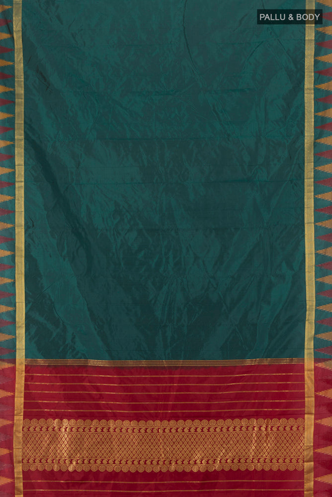 Flat view of Peacock Blue Bangalore Silk - kadyal Saree with Zari Butta on the body and Silk Border. 