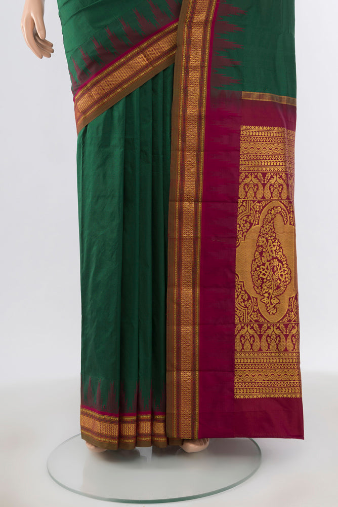 Pleats and pallu of Pure Silk Pure Zari Bottle Green Bangalore - kadyal Saree with Zari Butta on the body and Silk Border. 
