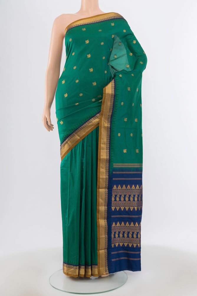 Pure Silk Pure Zari Peacock Blue Bangalore - kadyal Saree with Zari Butta on the body and Silk Border.  displayed on a mannequin