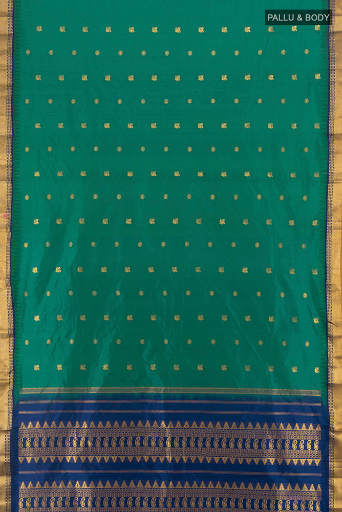 Flat view of Pure Silk Pure Zari Peacock Blue Bangalore - kadyal Saree with Zari Butta on the body and Silk Border. 