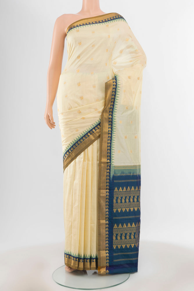 Pure Silk Pure Zari Cream Bangalore - kadyal Saree with Zari Butta on the body and Silk Border.  displayed on a mannequin