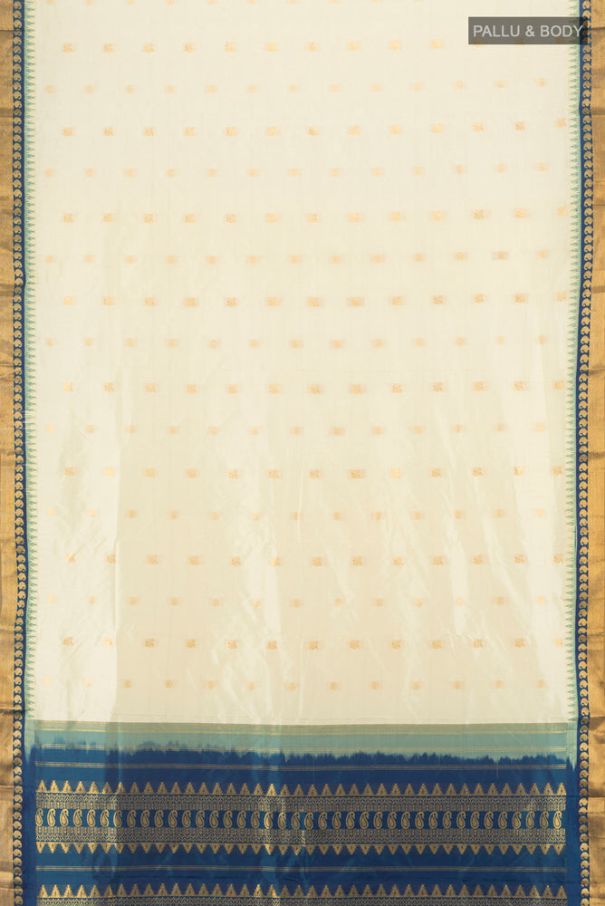 Flat view of Pure Silk Pure Zari Cream Bangalore - kadyal Saree with Zari Butta on the body and Silk Border. 