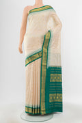 Pure Silk Pure Zari Cream Bangalore - kadyal Saree with Zari Butta on the body and Silk Border.  displayed on a mannequin