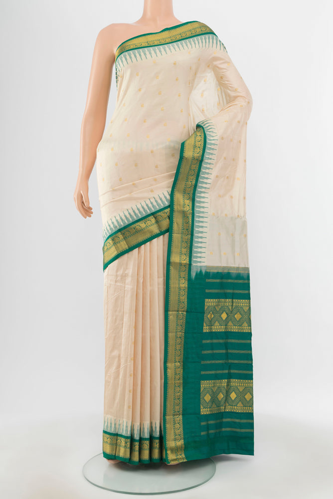 Pure Silk Pure Zari Cream Bangalore - kadyal Saree with Zari Butta on the body and Silk Border.  displayed on a mannequin