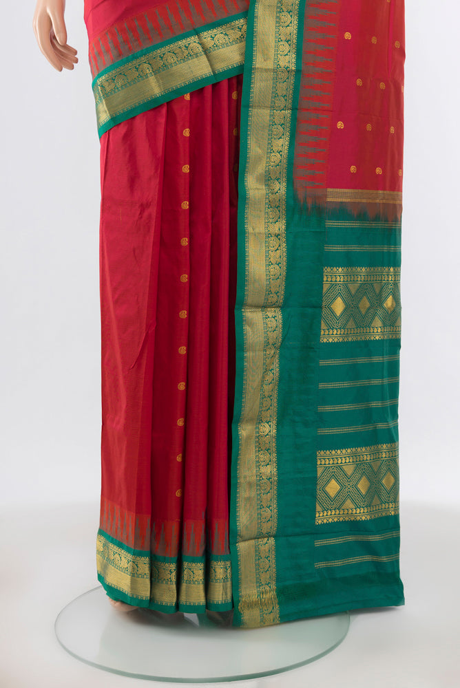 Pleats and pallu of Pure Silk Pure Zari Peach Bangalore - kadyal Saree with Zari Butta on the body and Silk Border. 