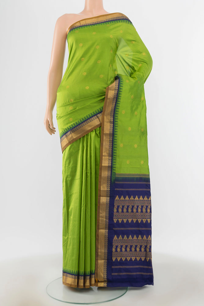Parrot Green Bangalore Silk - kadyal Saree with Plain Body and Silk Border.  displayed on a mannequin
